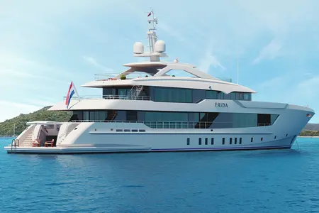 Project Frida - A luxury yacht named 'Frida' anchored in the blue ocean with a scenic view of hi