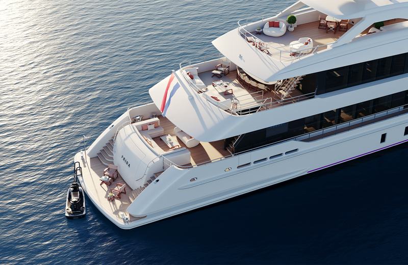 Project Frida - An aerial view of a luxury yacht named 'Frida' on a calm body of water, featurin