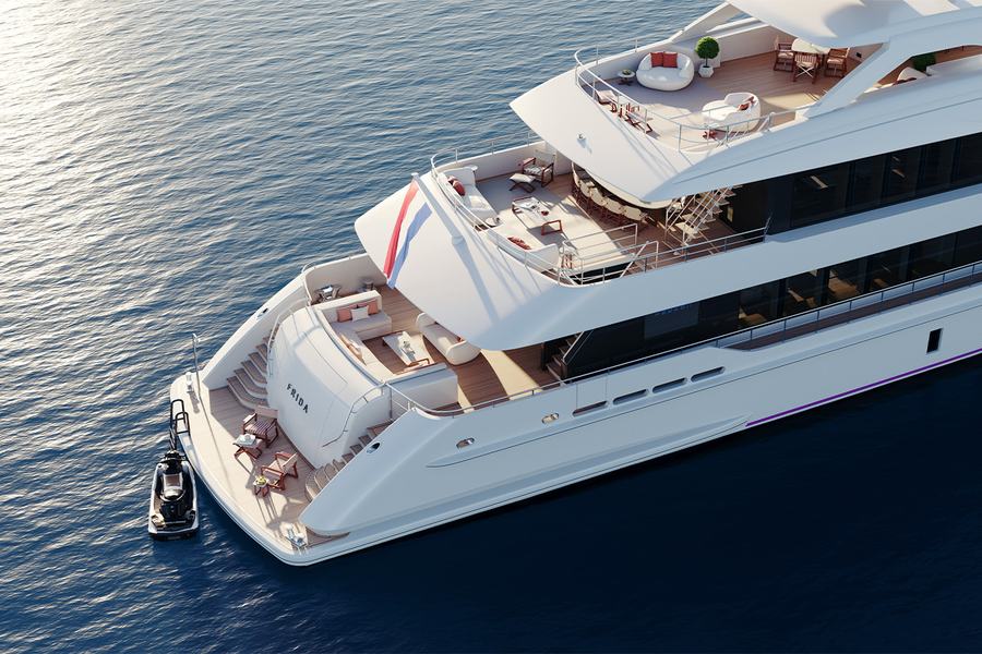 Project Frida - An aerial view of a luxury yacht named 'Frida' on a calm body of water, featurin