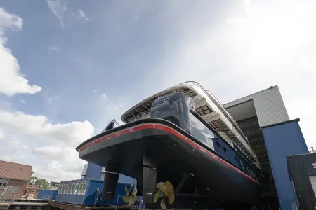 Halcyon quarter view during launch from major refit by Feadship