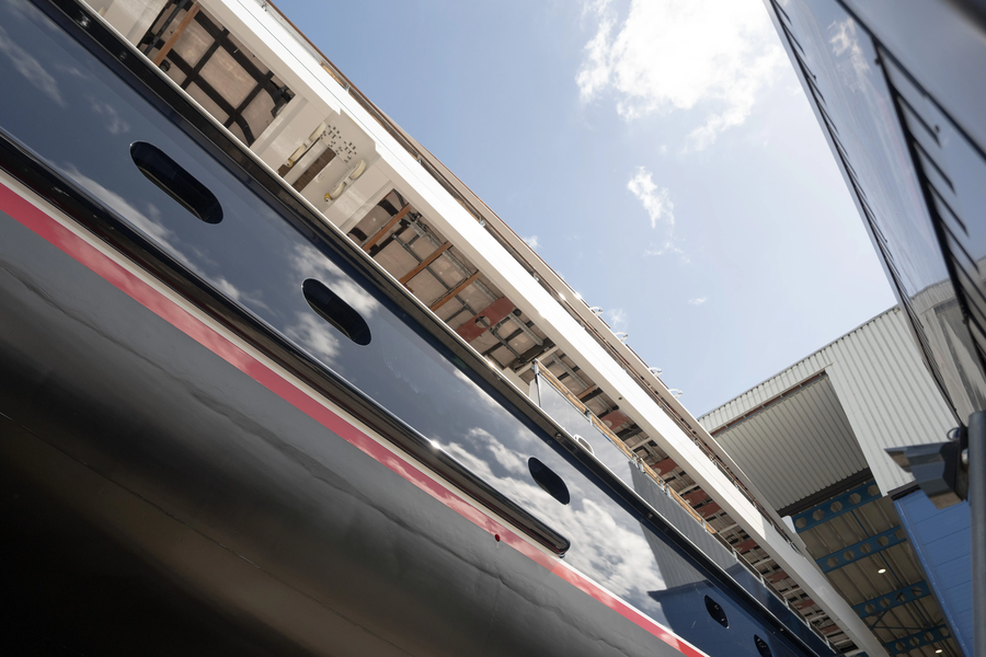 Halcyon starboard hull view during launch by Feadship after major refit.