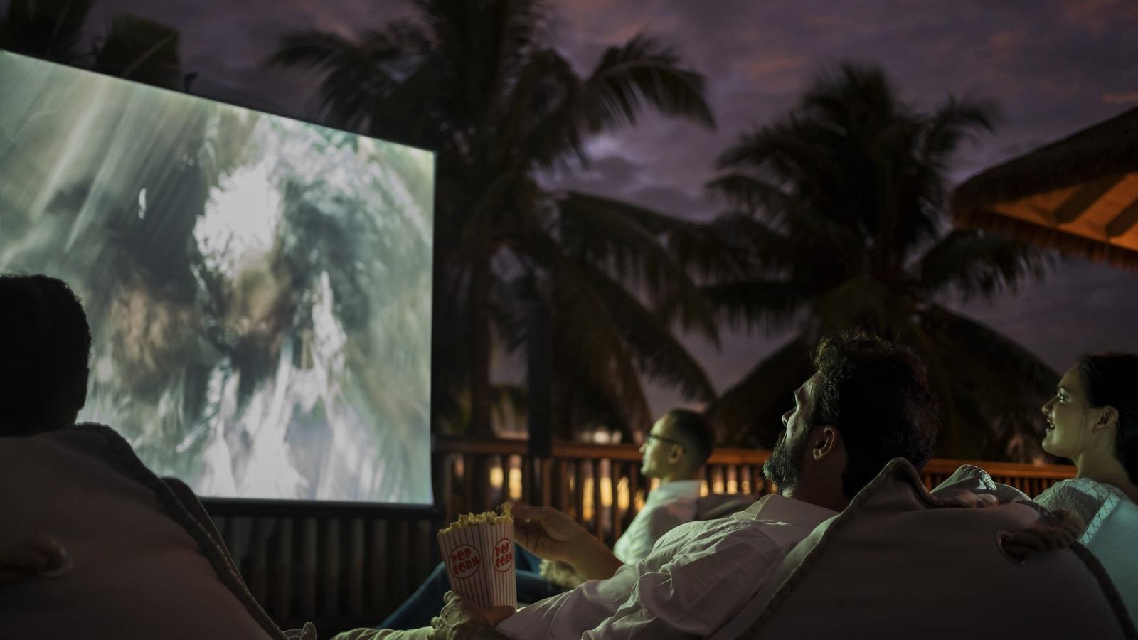 Bali Adds a Quiet Beach Cinema with Sound Through Guests' Phones — official Four Seasons Resort Bali at Jimbaran Bay image