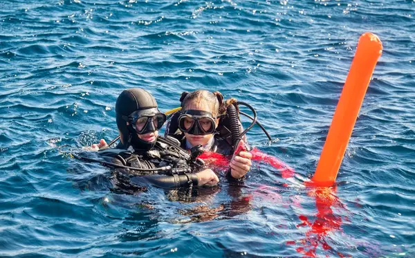 Garmin and DAN Link Satellite SOS with Specialist Dive Support — official Garmin International / Divers Alert Network image