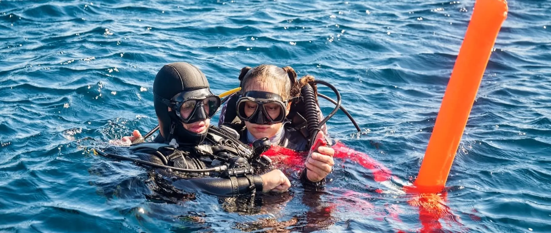 Garmin and DAN Link Satellite SOS with Specialist Dive Support — official Garmin International / Divers Alert Network image