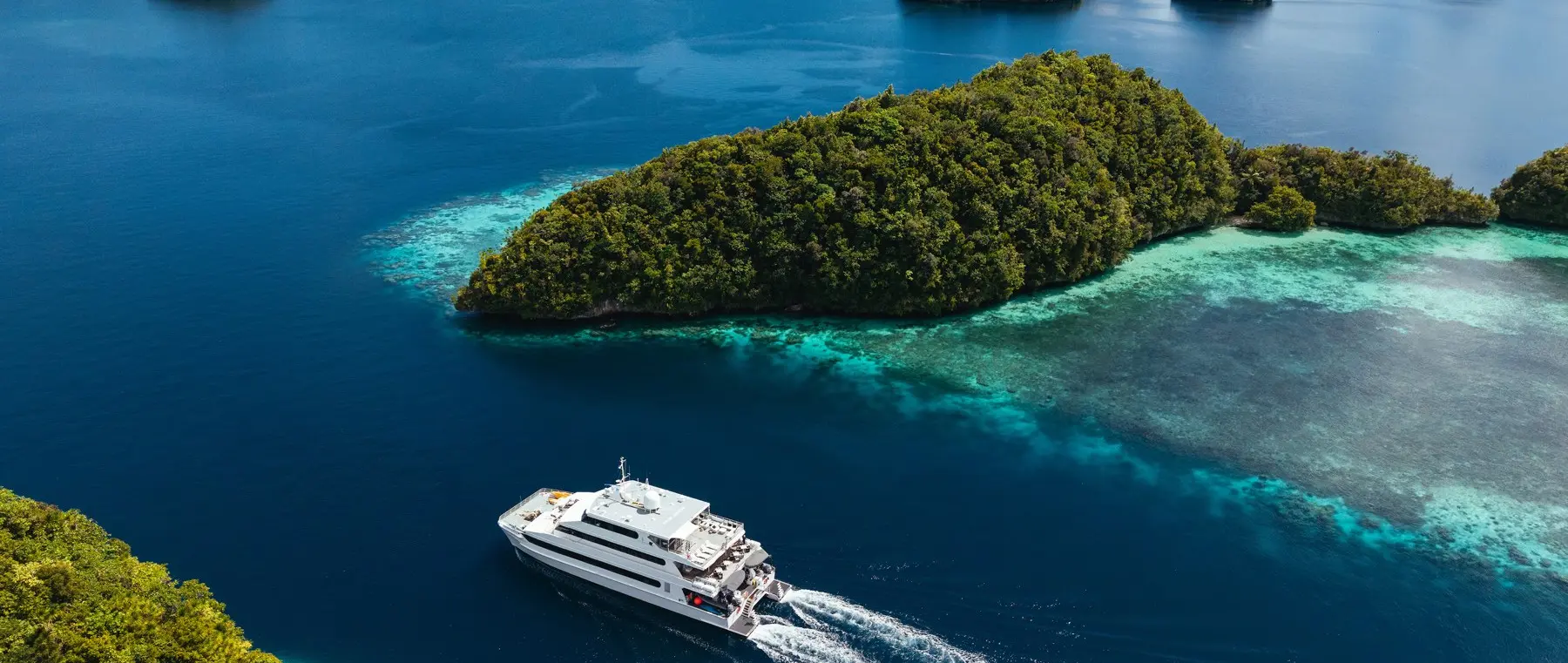 39m Four Seasons Explorer Adds Remote Kayangel to Palau Voyages — official Four Seasons Explorer Palau image