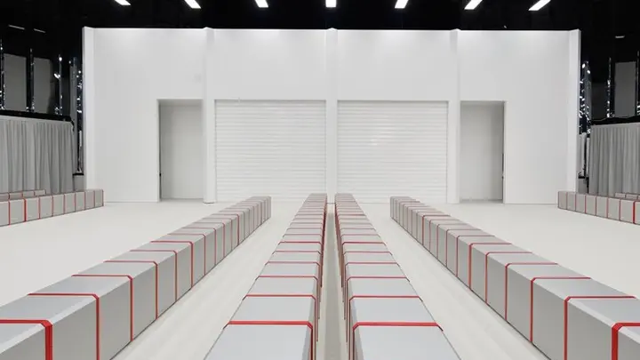 Ferrari SS26 Fashion Show Turns Milan’s Teatro Alcione Into an Officina — official source image
