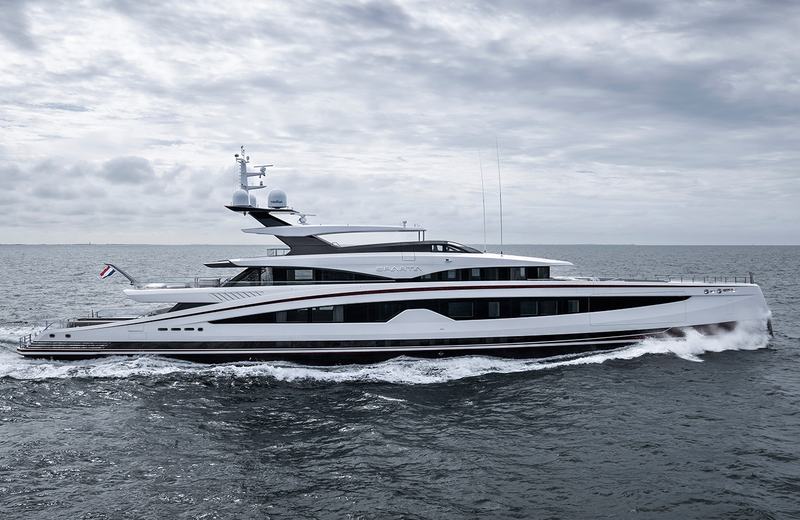 Sparta - A luxury yacht named Sparta cruising on the ocean under a cloudy sky, with waves